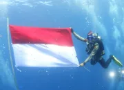 Polres Wakatobi Gelar Pengibaran Bendera Merah Putih Di Bawah Laut Bertepatan HUT RI Ke 80